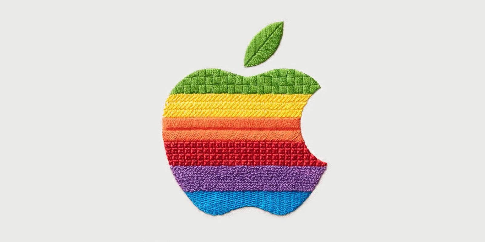 Logotipo de Apple en color claro sobre fondo blanco, con el texto Welcome home en negro debajo.
